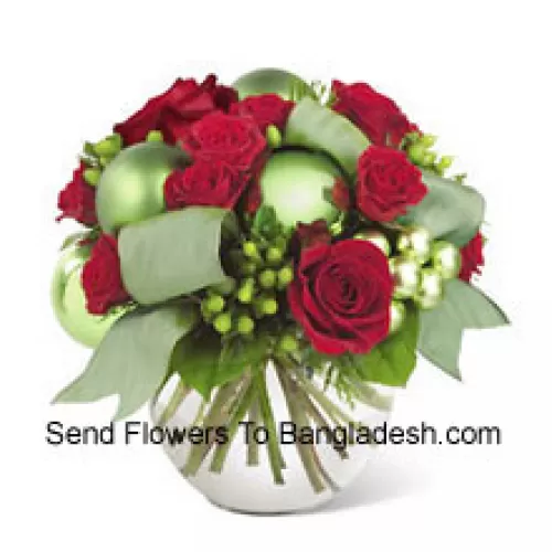 This new holiday bouquet combines festive red roses, spray roses and more with bright green ornaments and seasonal accents for a classic look with a contemporary new twist!  (Please Note That We Reserve The Right To Substitute Any Product With A Suitable Product Of Equal Value In Case Of Non-Availability Of A Certain Product)