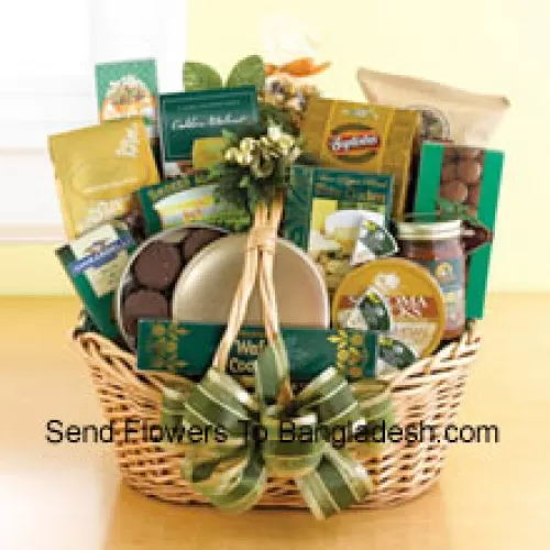 Start a tradition of sending good taste to your recipient this year. Our classic wicker basket comes piled high with a gourmet assortment that is sure to please the recipient. We accent the basket with green and gold ribbon and accents to make a great impression. Inside, your recipient will discover an assortment that features something for everyone: Lindt chocolate truffles, smoked almonds, walnut cookies, chocolate cookies, chocolate-covered popcorn, cheese, crackers, a Ghirardelli chocolate bar, tortilla chips, salsa, chocolate wafer cookies , cheese swirls, and chocolate-covered sandwich cookies. (Please Note That We Reserve The Right To Substitute Any Product With A Suitable Product Of Equal Value In Case Of Non-Availability Of A Certain Product)